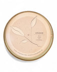 Round incense burner with 'Awaken' design on a white background