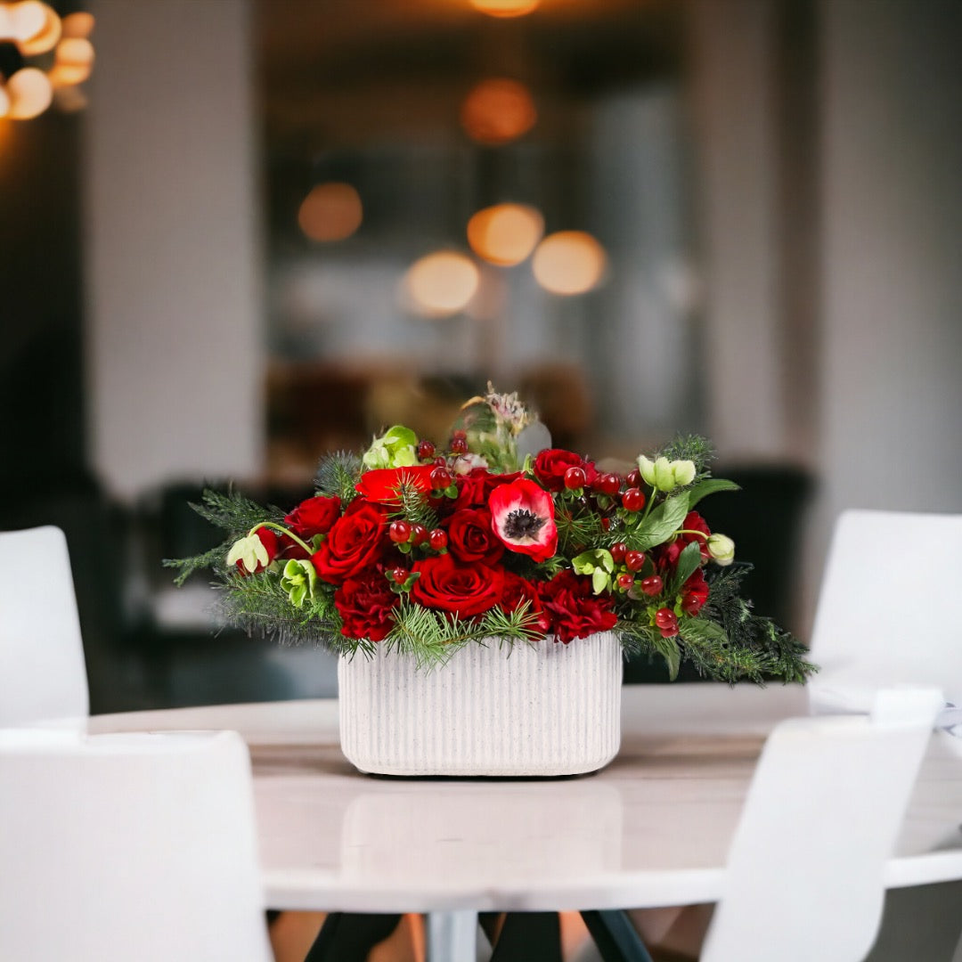 Scarlet Spice Floral on a White Table surrounded by white chairs